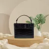 georgia leather handbag, sophisticated and trendy style, chic box bag, crocodile pattern, minimalist and elegant design