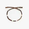 The Brown Moon Knitted Bracelet combines classic elegance and vintage style, making it a versatile artisan accessory - whether as a bohemian ankle piece, a woolen bracelet, or a thoughtful handmade birthday gift.