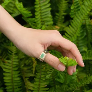 “neat” ring, ceramic face with leather cord, striking square shape, handmade label, unique gift for friends