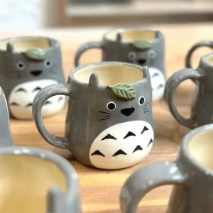 Ceramic Totoro Mug, handcrafted from high-quality materials, brings irresistible cuteness, making it the perfect gift for adding joy to your daily routine!