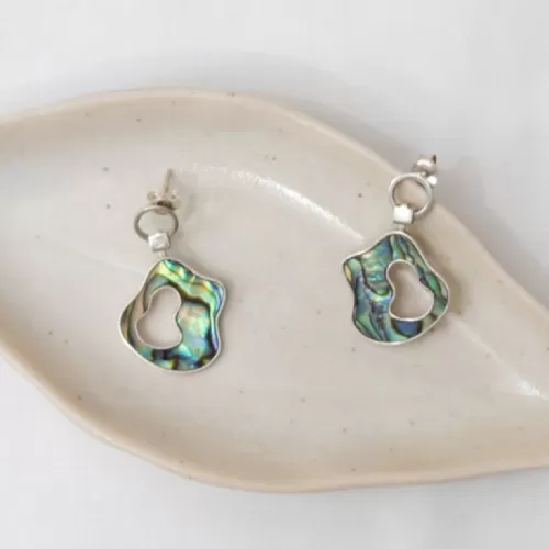 asteroid earrings, natural abalone shell veins, magical colors, asymmetrical design, trendy style, breaks boundaries