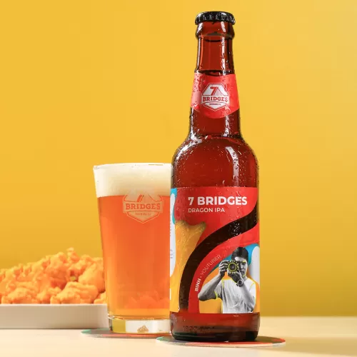 dragon ipa craft beer, traditionally brewed beer, packaging inspired by the dragon bridge in da nang, explosive flavor sensation