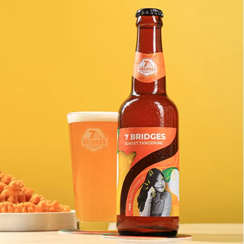 sunset tangerine craft beer, the main ingredient being juicy water-rich tangerines, refreshing fruity taste, easy-to-drink