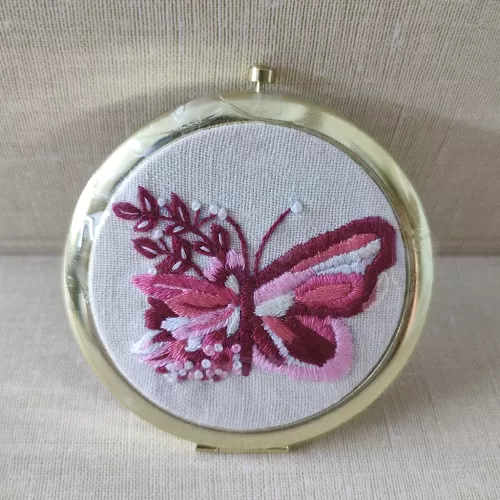 pink color embroidered compact mirror, handcrafted product, feminine style, compact handheld mirror, detailed and sharp embroidery