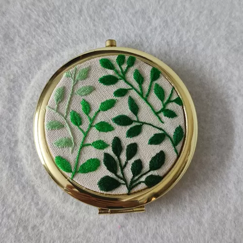 green leaves embroidered compact mirror, intricate embroidery, non-fading colors, foldable, compact, sturdy handheld mirror