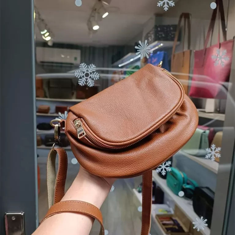 azaki leather bag, durable genuine leather material, small inner pocket, unique design, customizable engraving option, feminine accessory