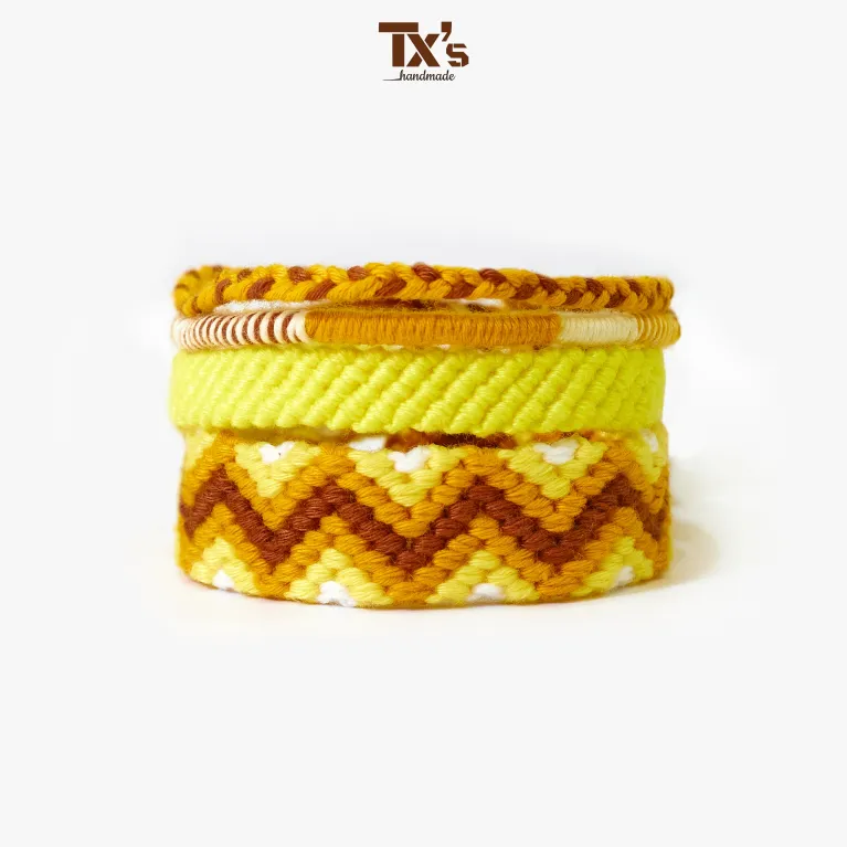 The "Sunshine" Knitted Bracelet Set, featuring four artistic wool bracelets, is a vibrant fashion accessory that brightens up your day and makes a thoughtful birthday gift or the perfect present for her.