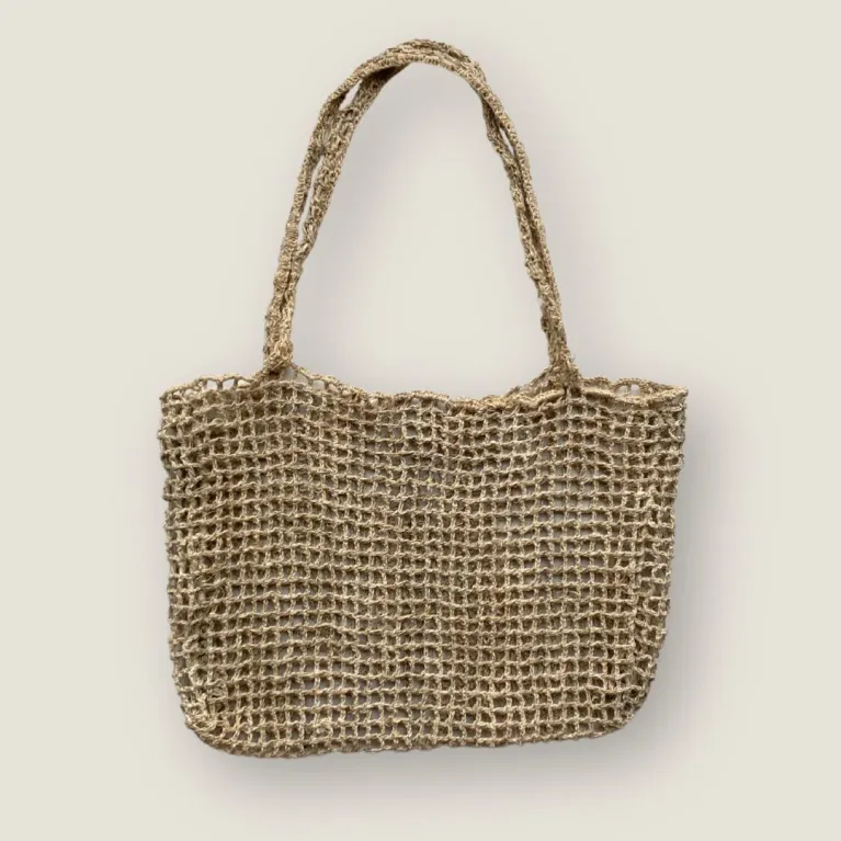 The Hemp Versa Basket Tote Bag is a timeless classic, beautifully crafted as a crocheted hemp handbag, making it the perfect eco-friendly handmade tote bag and a versatile sustainable fashion accessory, ideal as a thoughtful birthday gift.