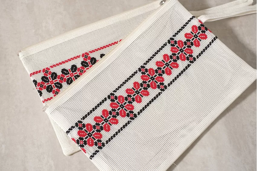 White Clutch With Embroidered Petals, Fashionable Clutch Design, Durable Textilene Material, Embroidered Flower Wings Pattern